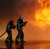 Firefighters extinguish a fire