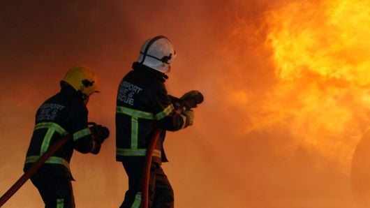 Firefighters extinguish a fire