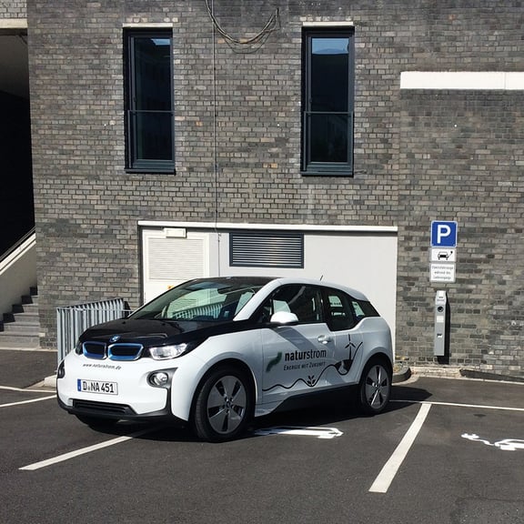 Electric car at charging station