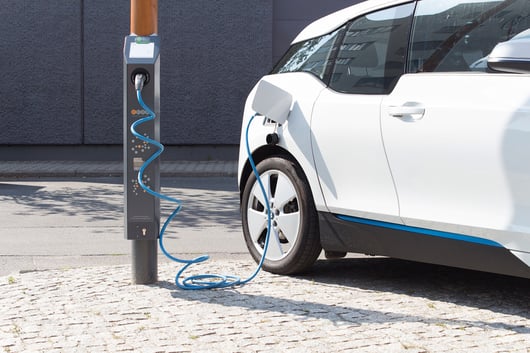 Electric car at charging station
